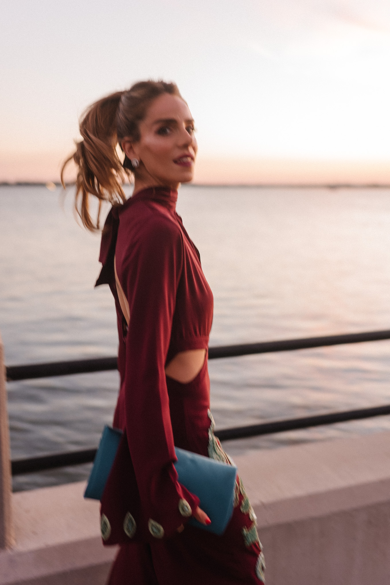 maroon and teal silk beaded gown turquoise clutch pink heels diamond earrings