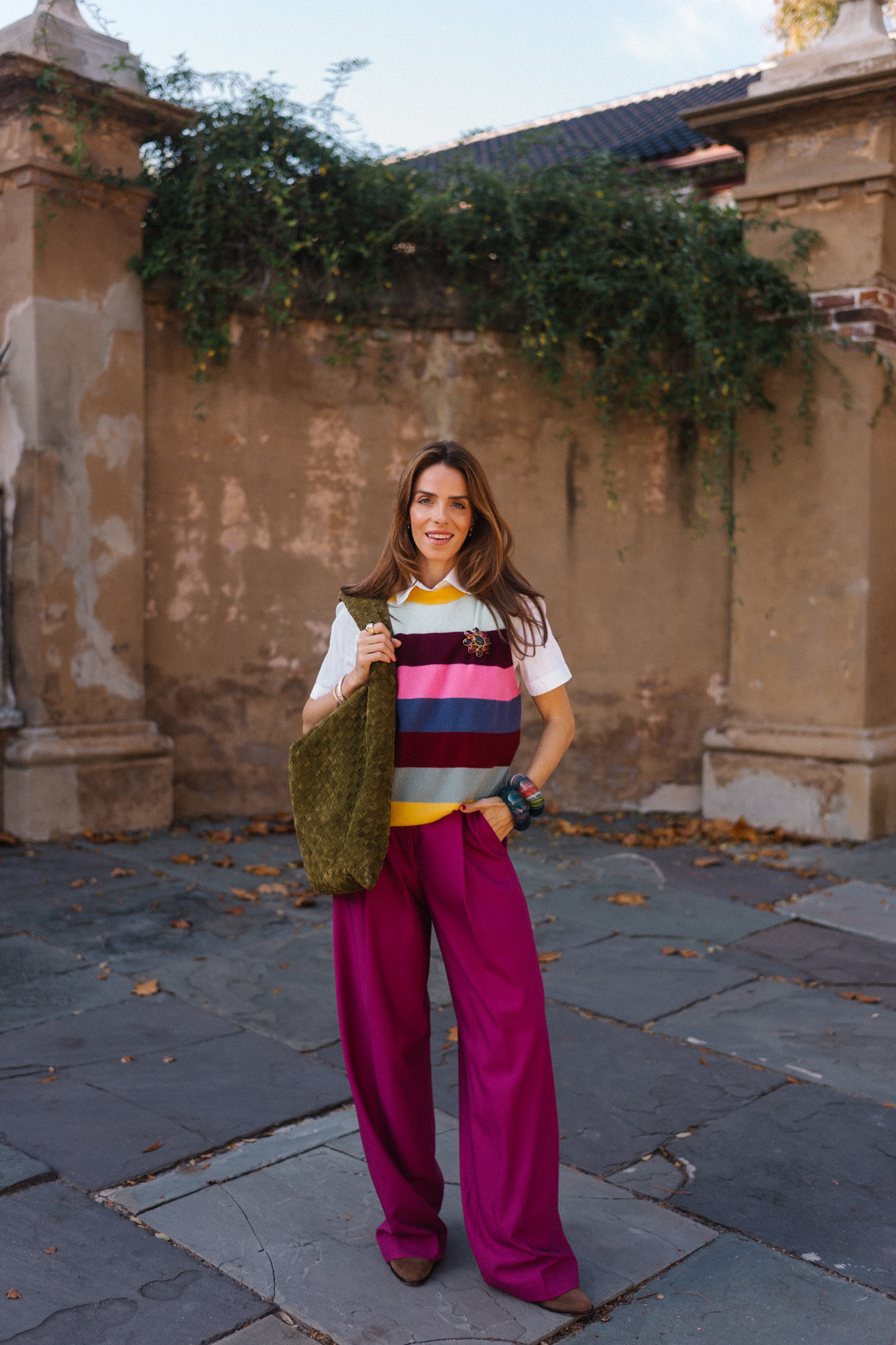 rainbow stripe sweater vest magenta satin pants green suede tote