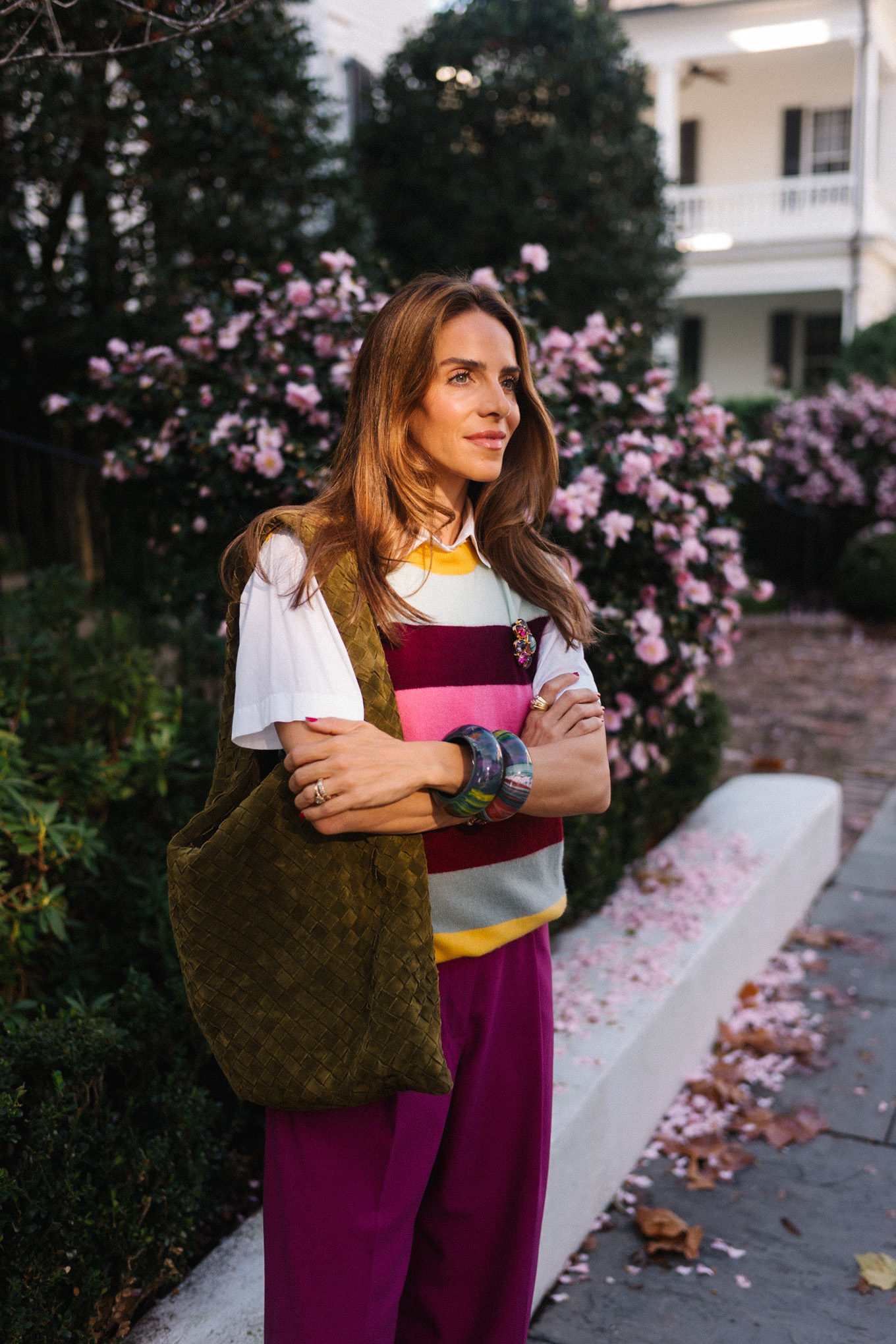 rainbow stripe sweater vest magenta satin pants green suede tote