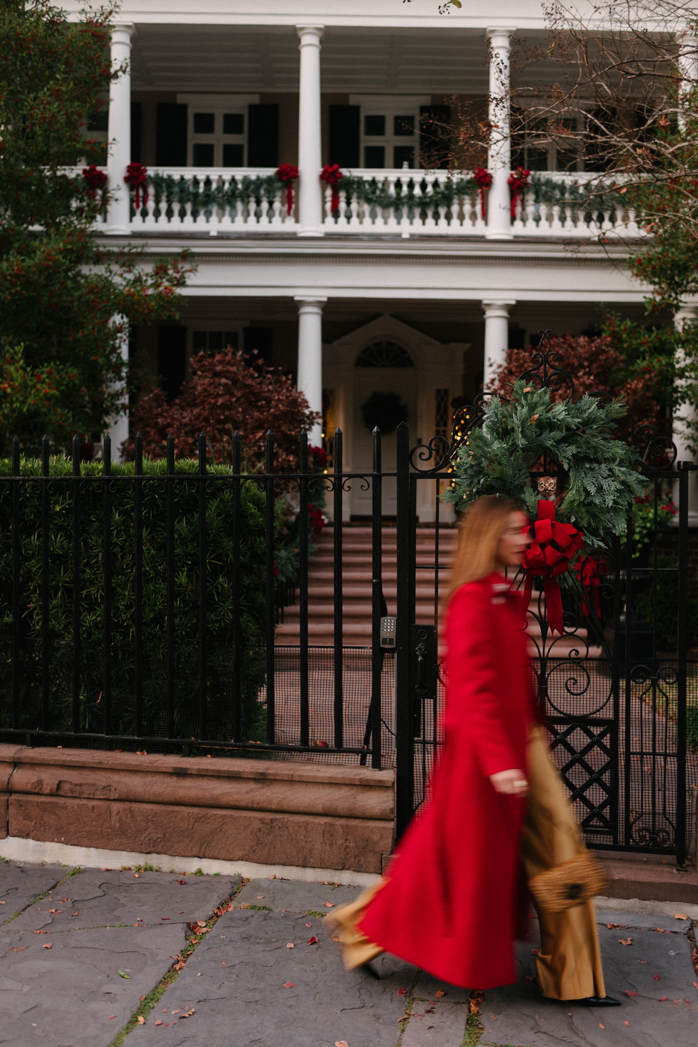 red wool coat red bodysuit gold satin pants leopard handbag