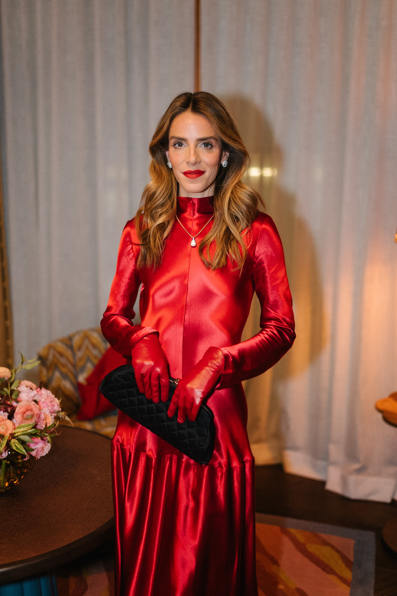 red satin long sleeved maxi dress red leather gloves