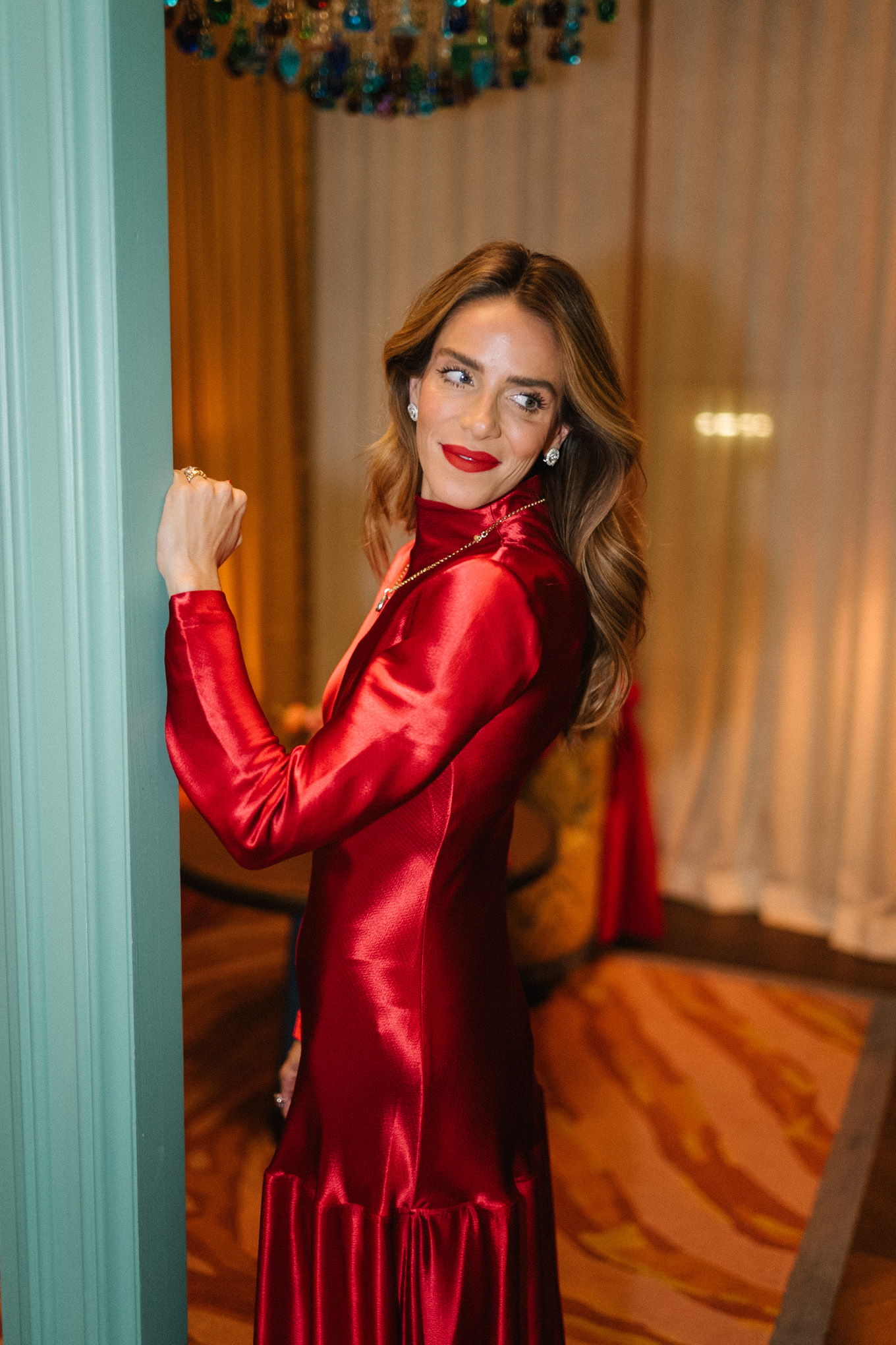 red satin long sleeved maxi dress red leather gloves