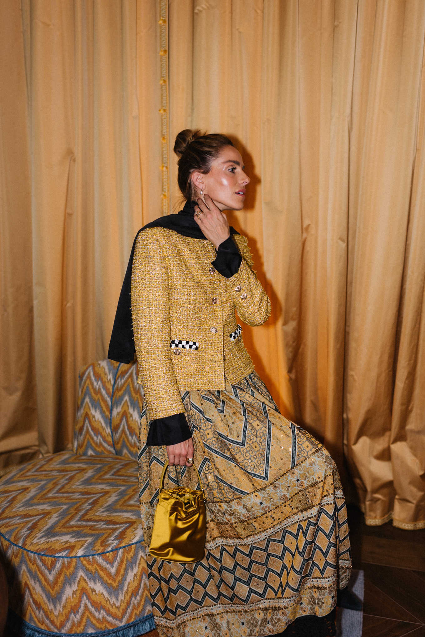 gold tweed jacket gold print skirt gold silk bucket bag black scarf black boots