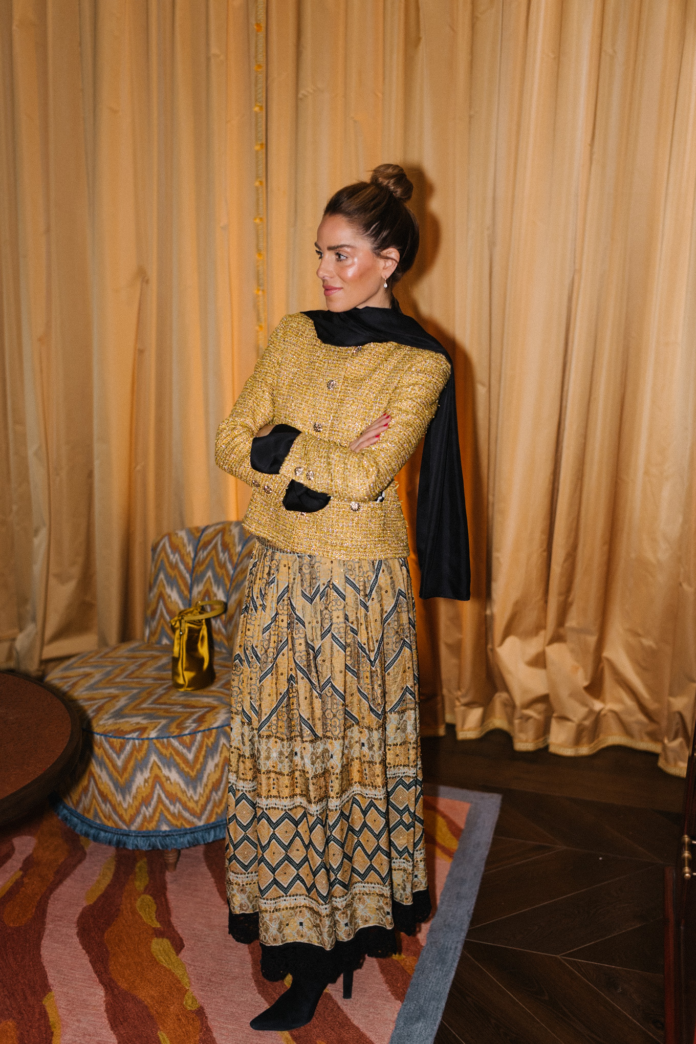 gold tweed jacket gold print skirt gold silk bucket bag black scarf black boots