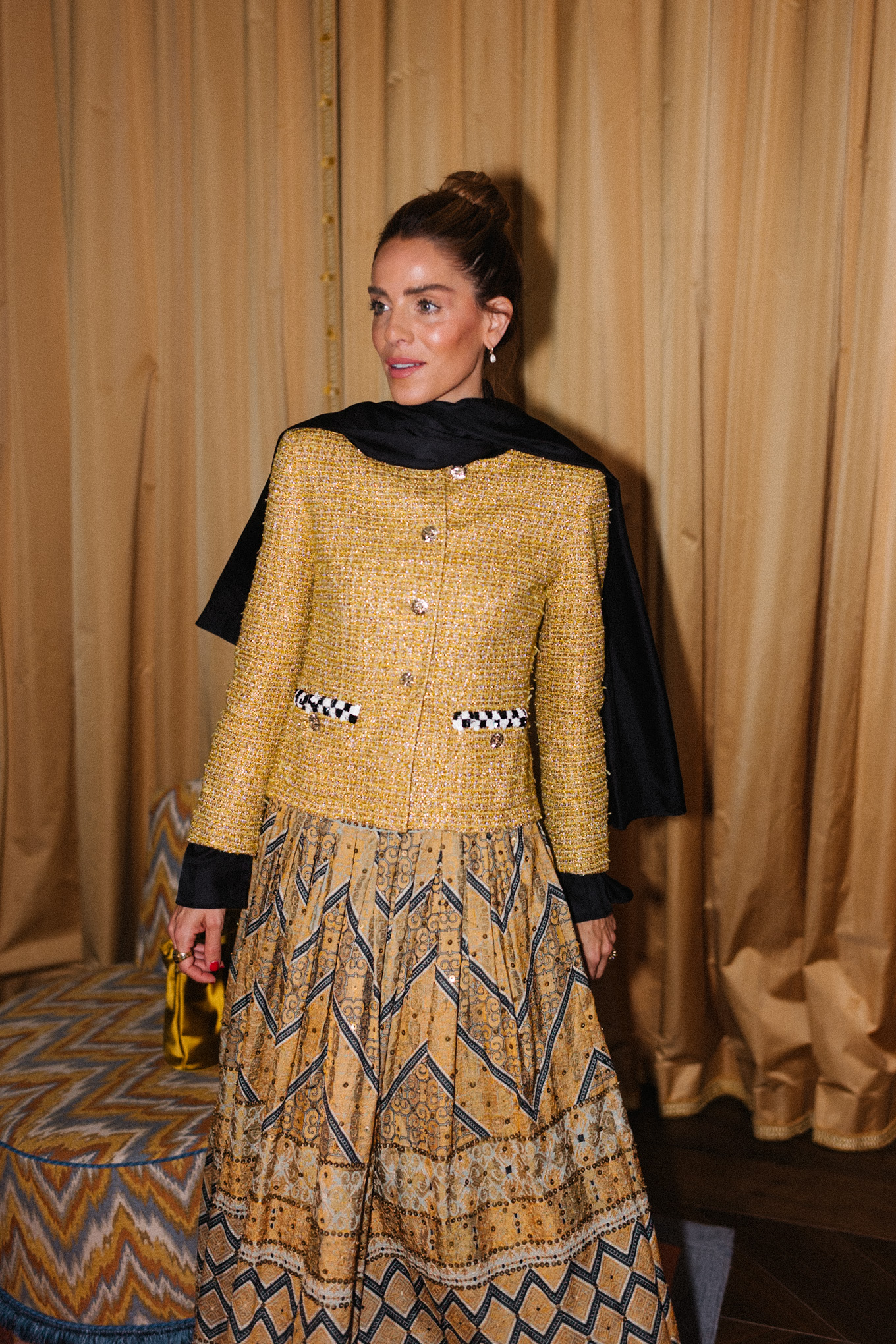 gold tweed jacket gold print skirt gold silk bucket bag black scarf black boots