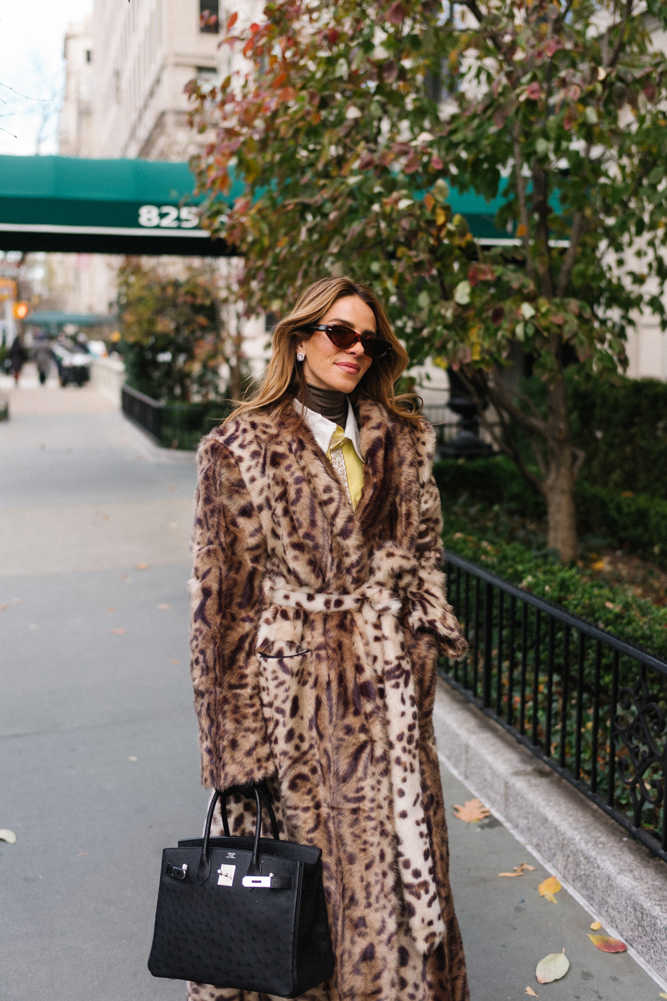 leopard coat silk jacket brown turtleneck tassel belt black handbag black gloves