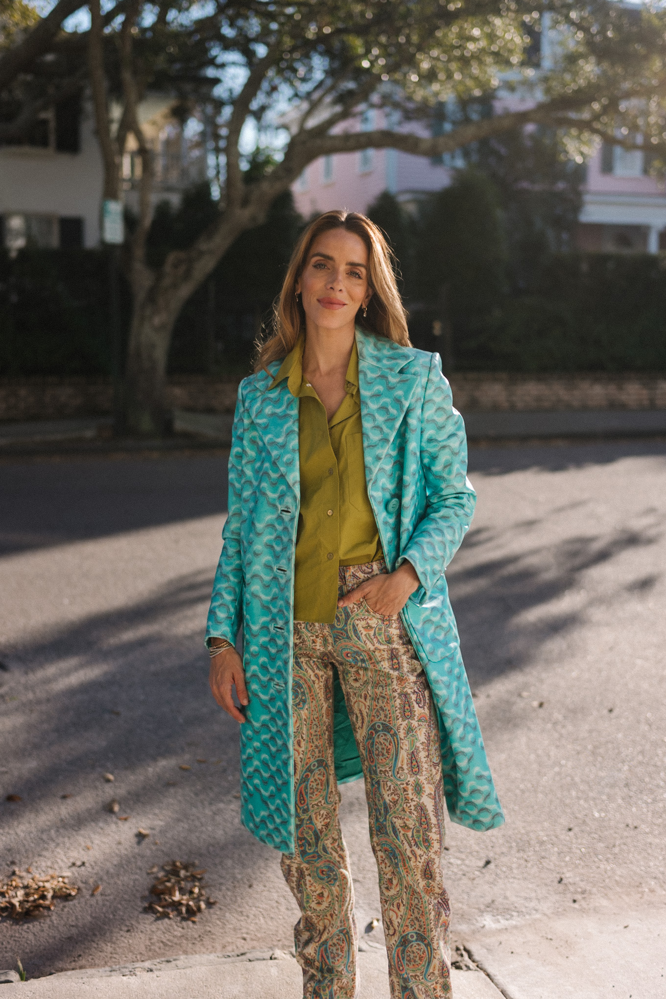 Turquoise vintage coat Chartreuse green button-down shirt Paisley jeans Brown boots