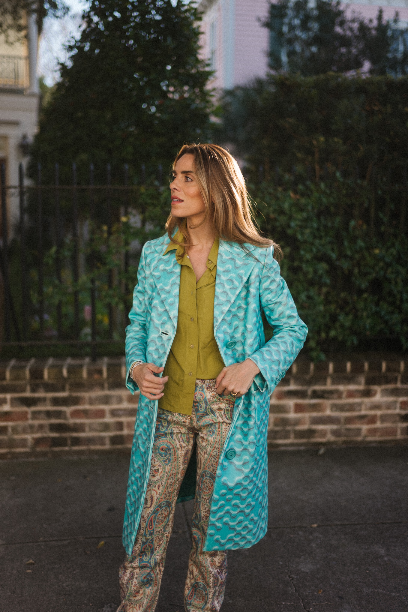 Turquoise vintage coat Chartreuse green button-down shirt Paisley jeans Brown boots