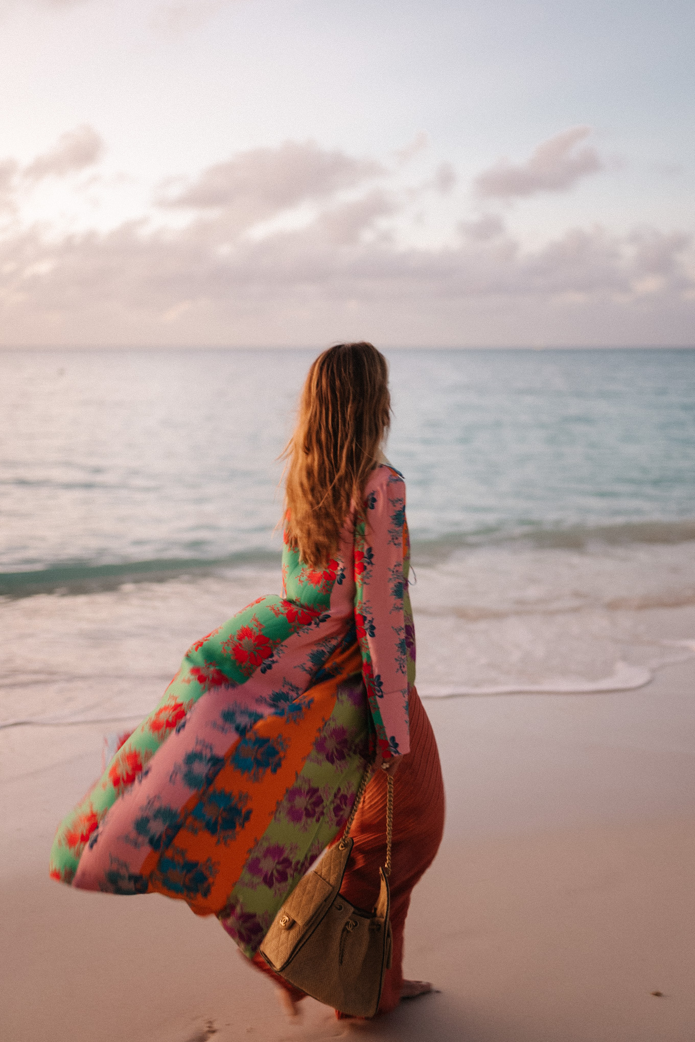 rainbow floral silk jacket silk wide leg pants rainbow beaded necklace rattan bag