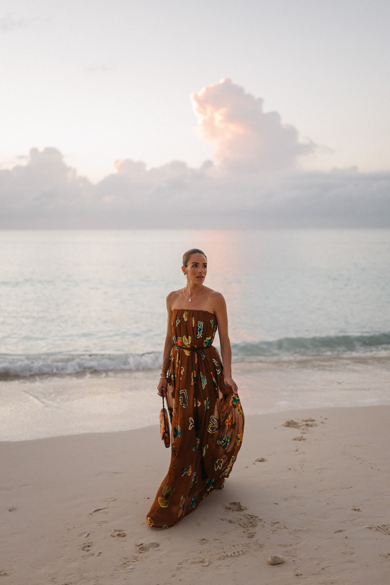brown strapless maxi dress woven rainbow handbag