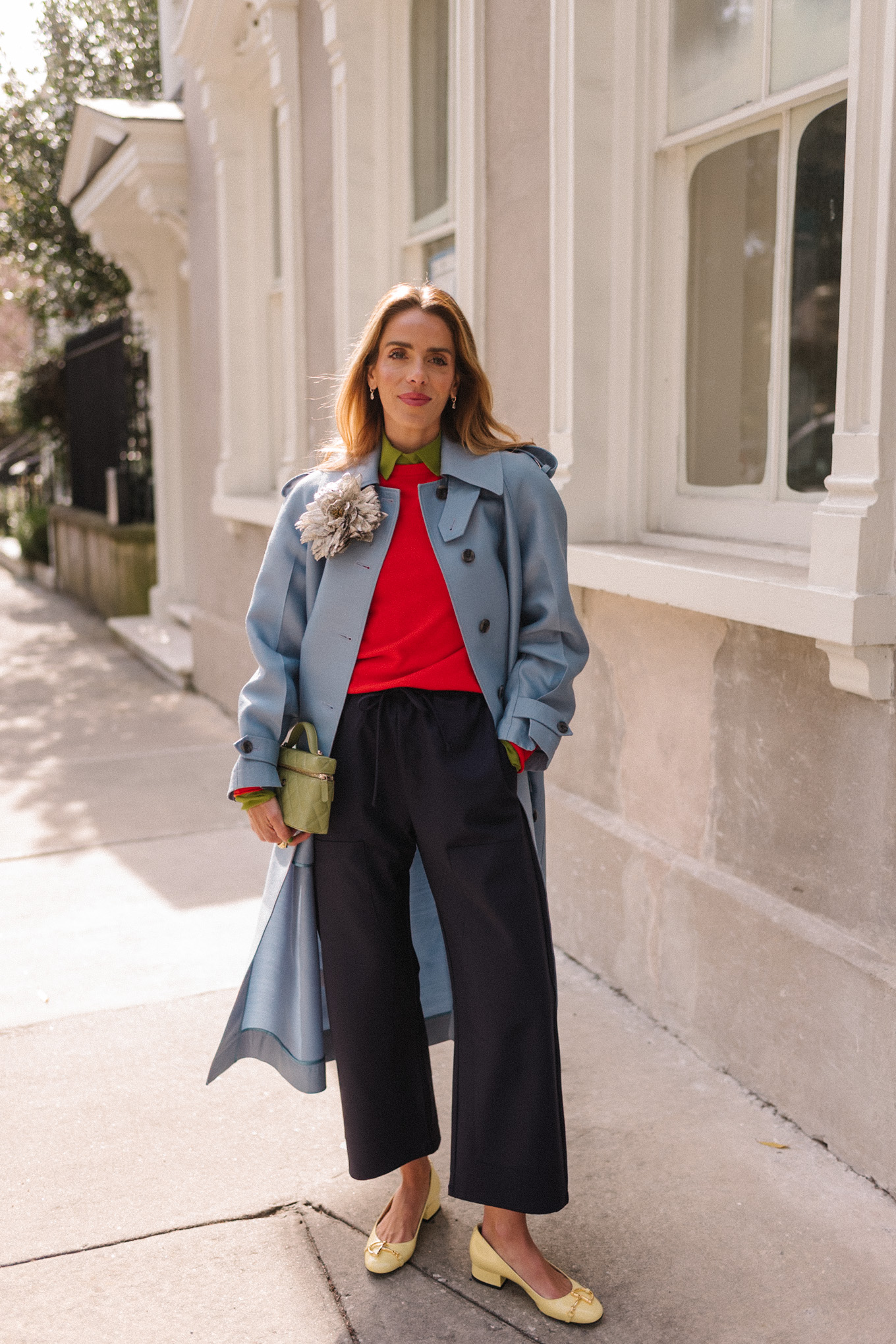 blue wool coat red sweater green blouse yellow flats flower brooch