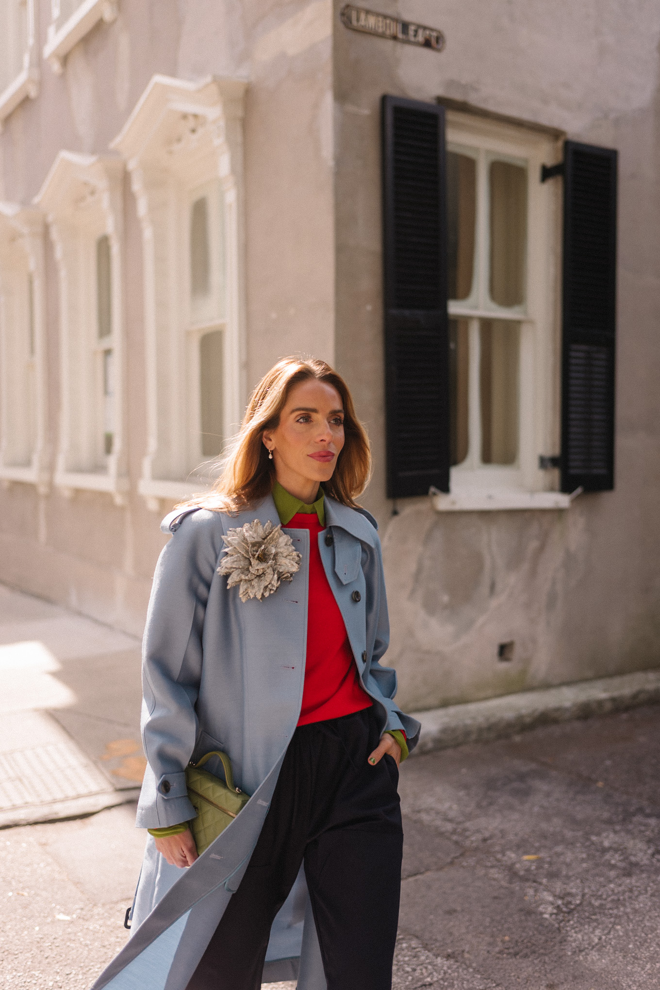 blue wool coat red sweater green blouse yellow flats flower brooch