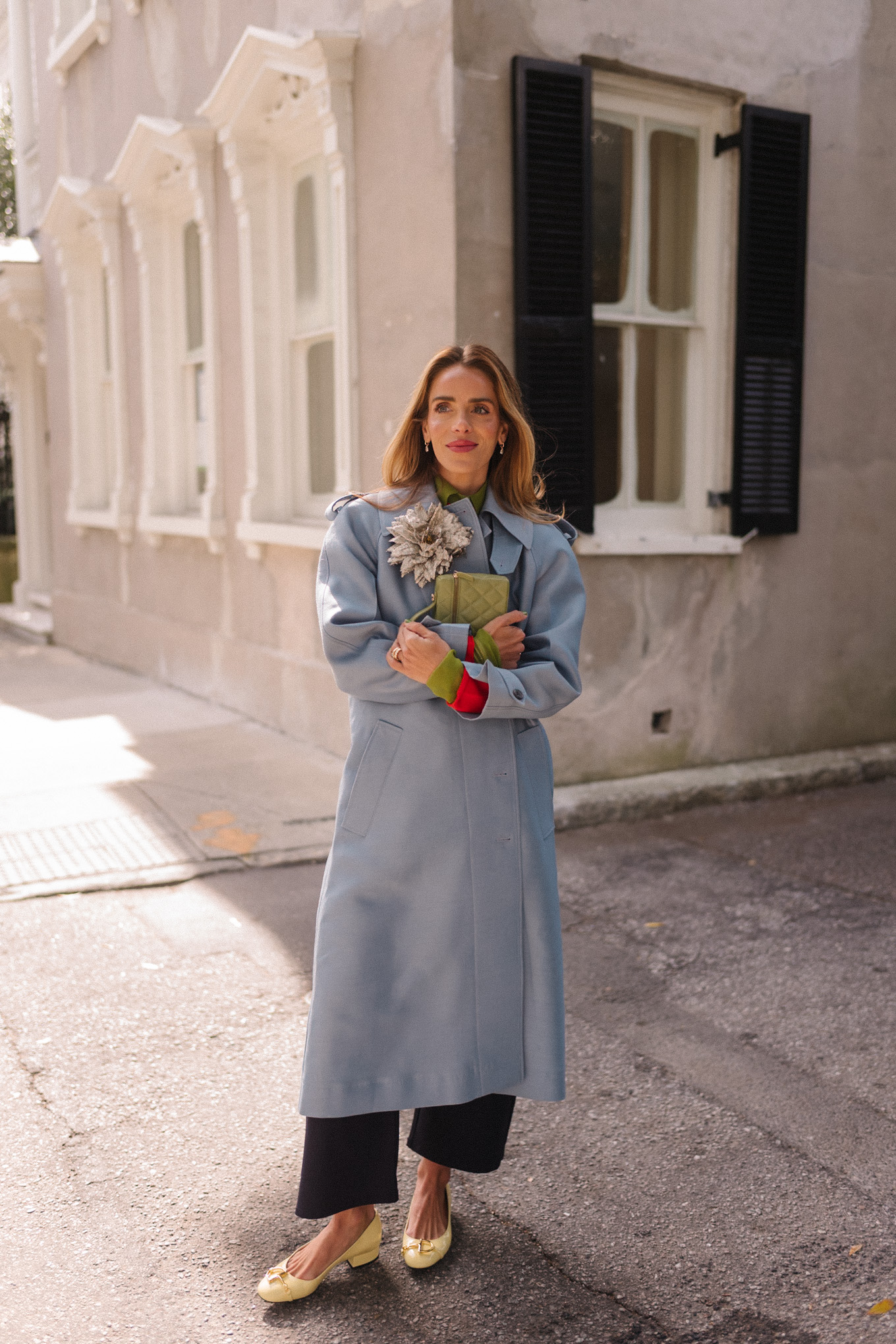 blue wool coat red sweater green blouse yellow flats flower brooch