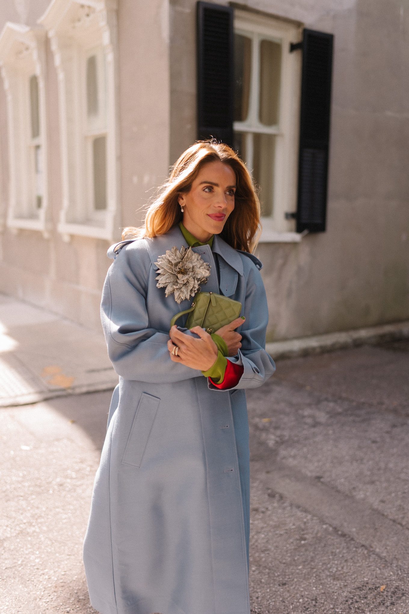 blue wool coat red sweater green blouse yellow flats flower brooch