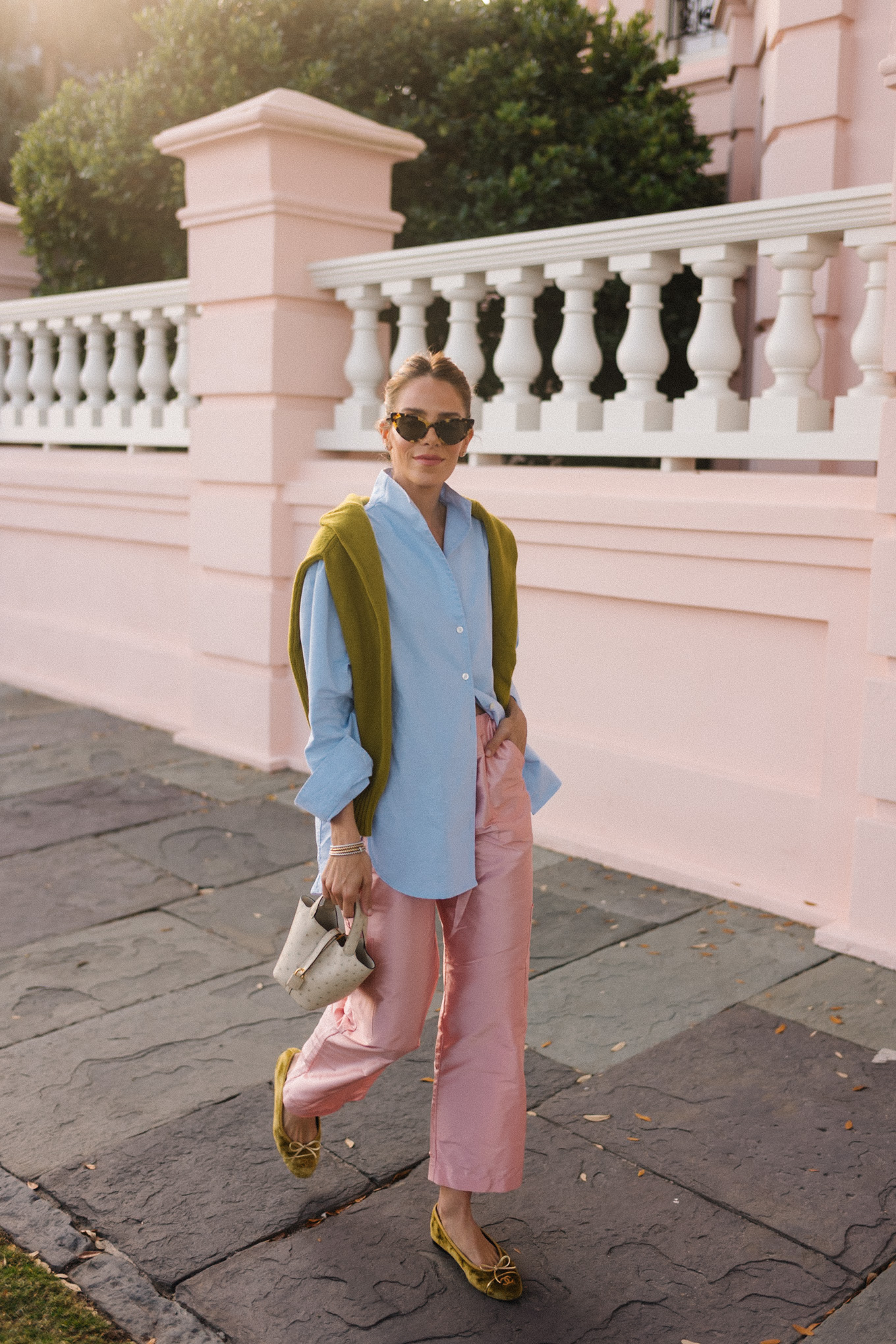 light blue button down chartreuse sweater pink taffeta pants velvet ballet flats