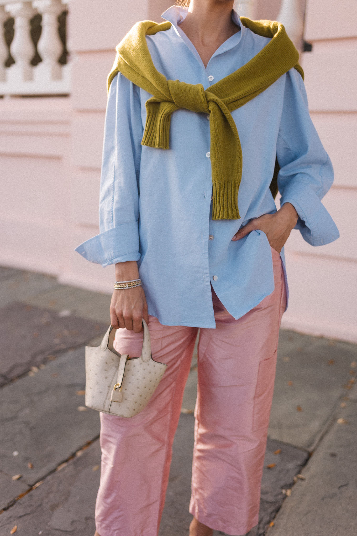 light blue button down chartreuse sweater pink taffeta pants velvet ballet flats