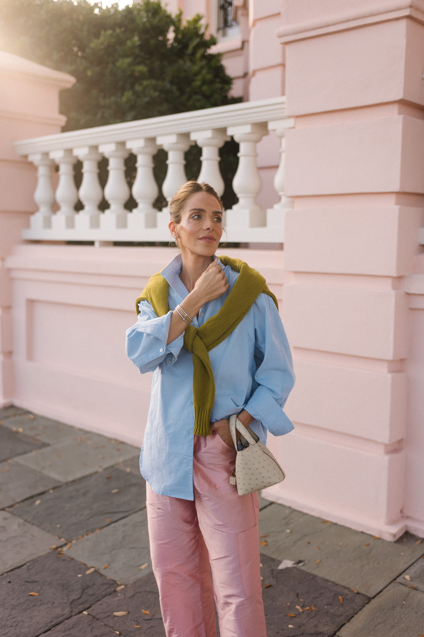 light blue button down chartreuse sweater pink taffeta pants velvet ballet flats