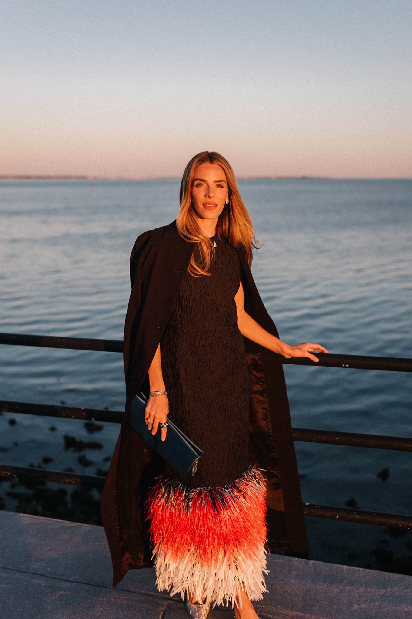 black feather trimmed midi dress silver pumps