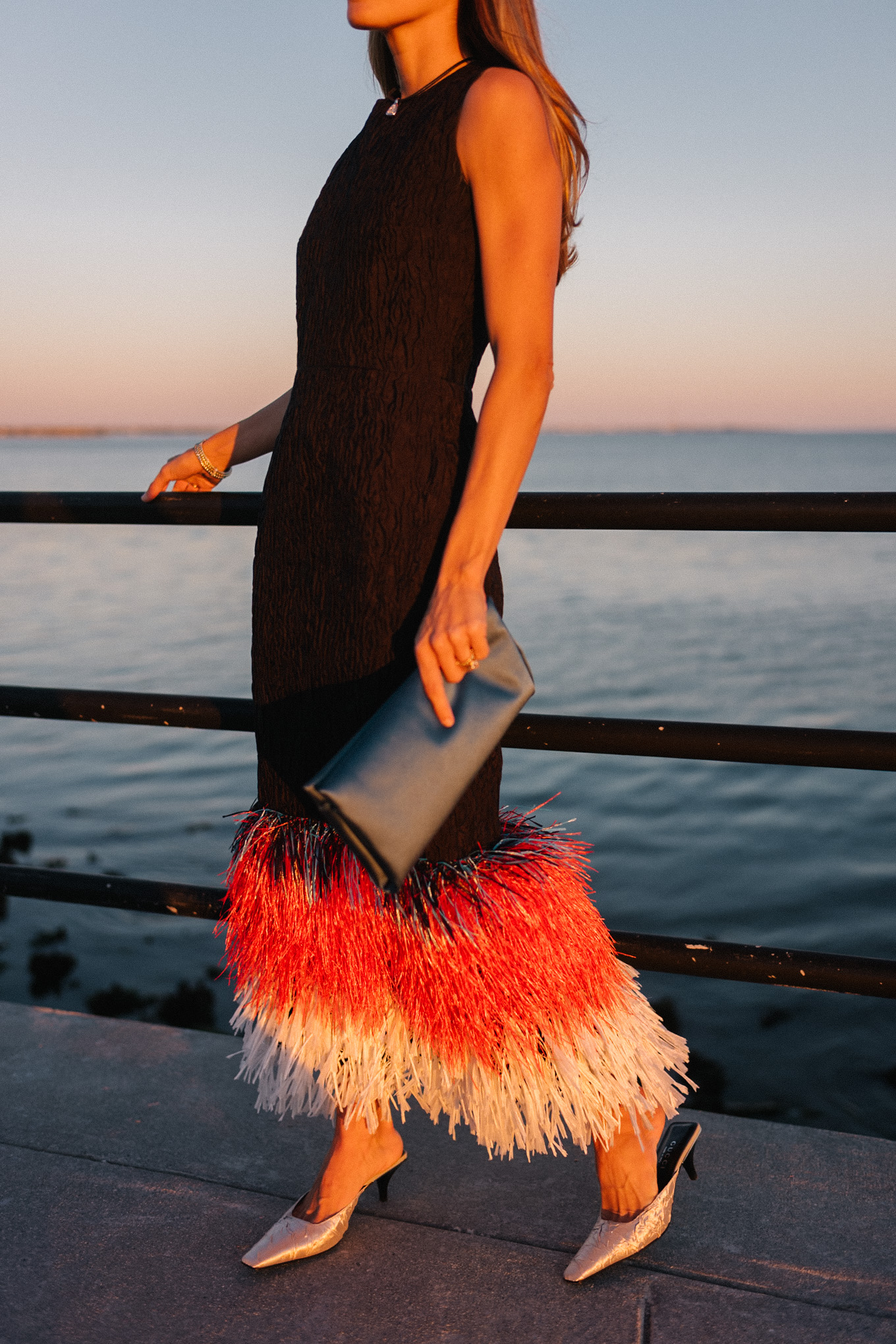 black feather trimmed midi dress silver pumps