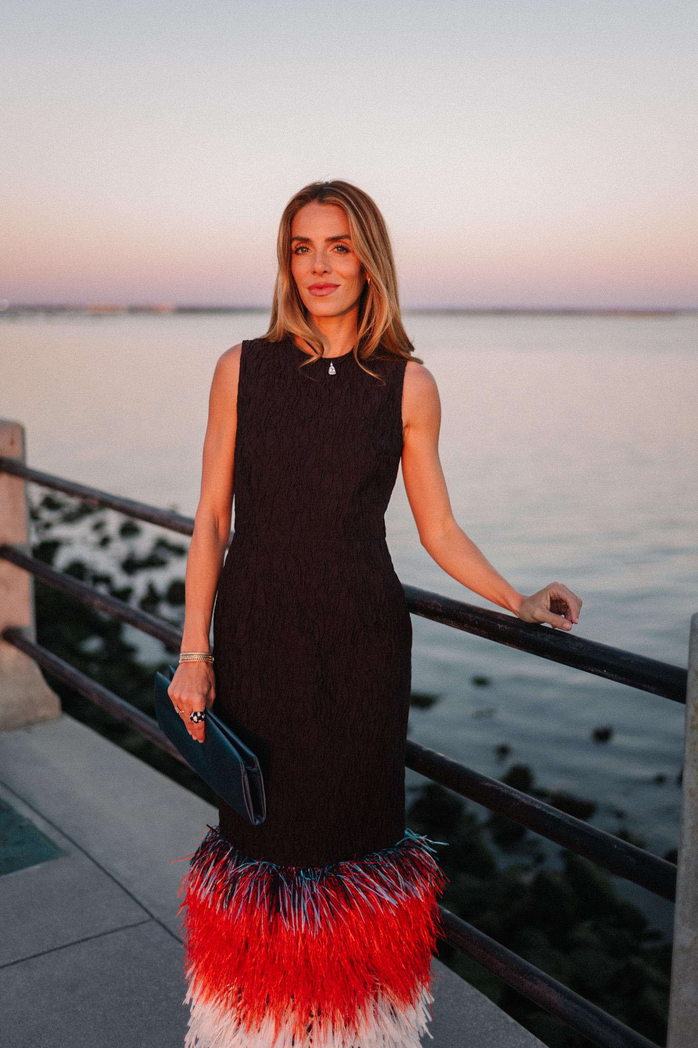 black feather trimmed midi dress silver pumps