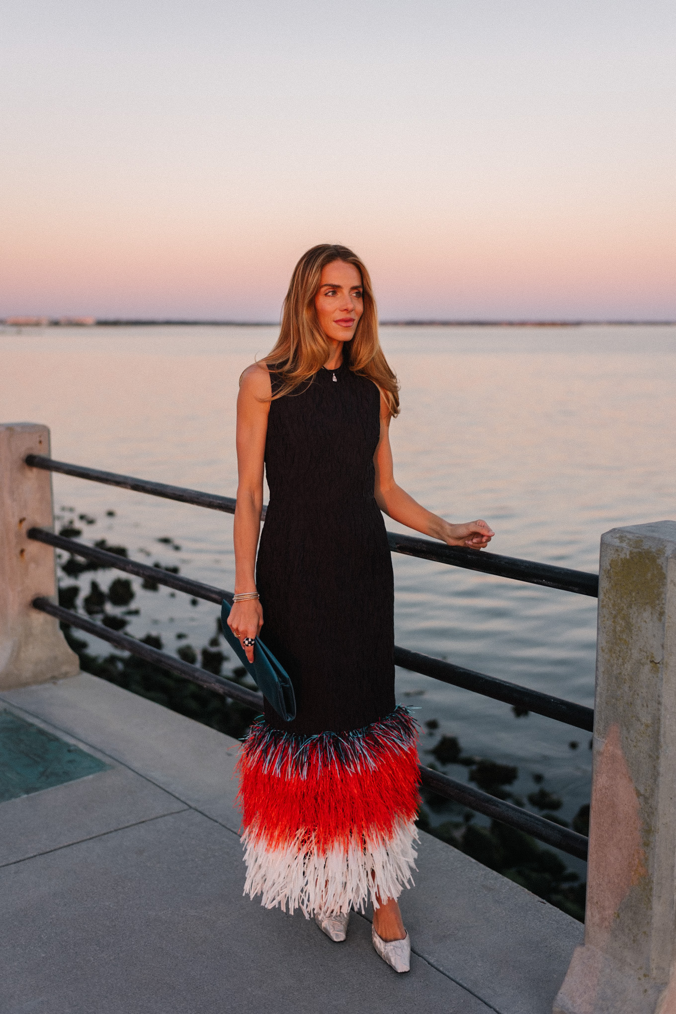 black feather trimmed midi dress silver pumps