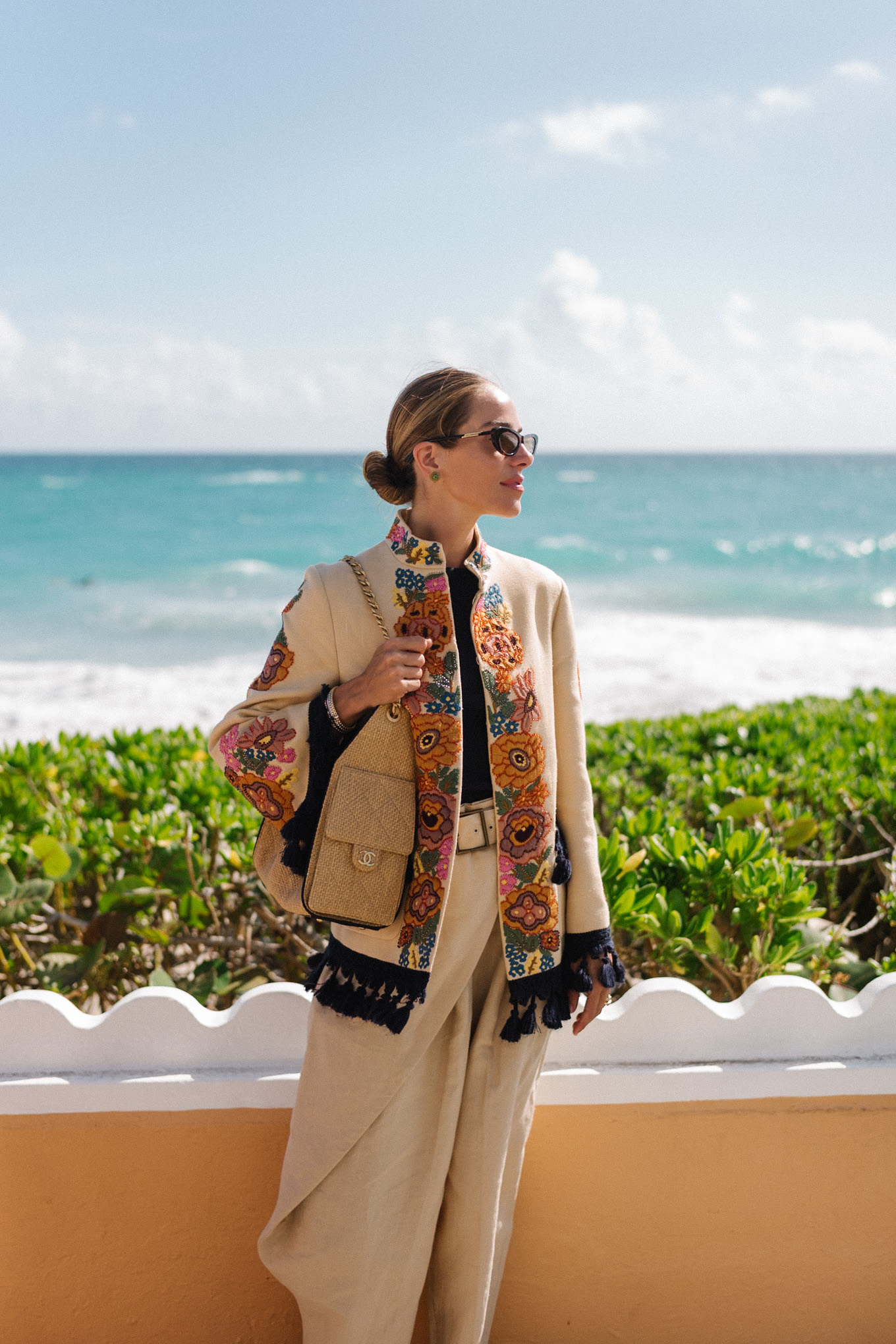 embroidered jacket black tee linen barrel leg pants brown leather strappy sandals