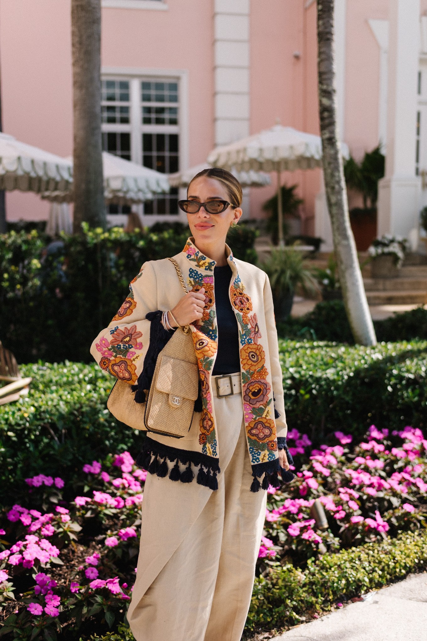 embroidered jacket black tee linen barrel leg pants brown leather strappy sandals