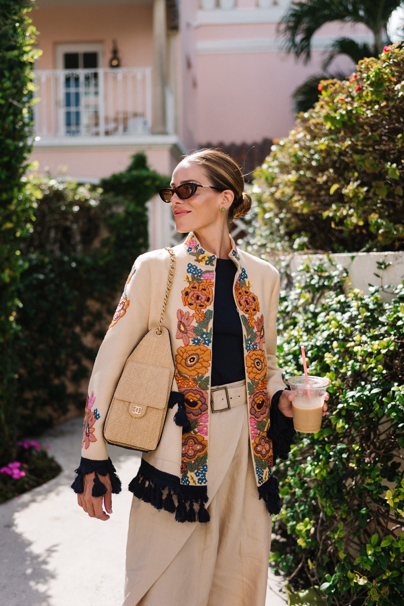 embroidered jacket black tee linen barrel leg pants brown leather strappy sandals